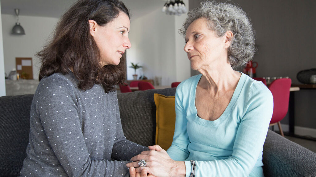 adult woman talking her mother